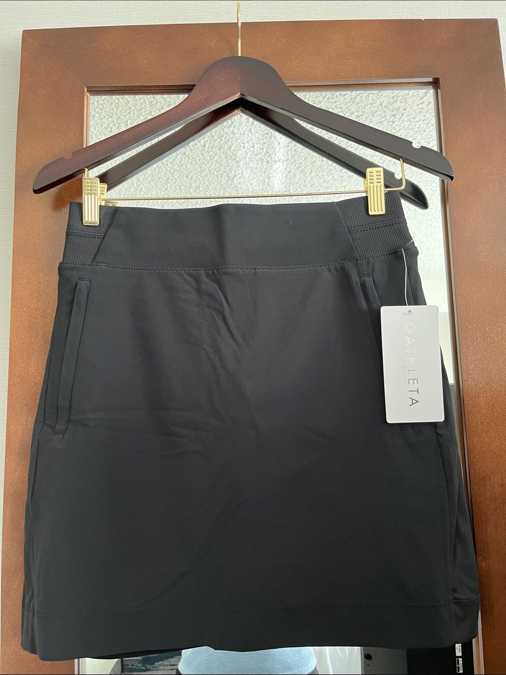 NWT  Brooklyn Black Active Skirt with Front and back Pockets, size 4T 16”